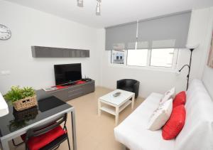 Μια τηλεόραση ή/και κέντρο ψυχαγωγίας στο Apartamento Mariposa