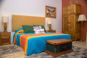 Postel nebo postele na pokoji v ubytování Casona Tlaquepaque Temazcal & Spa