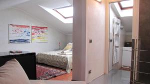 Una cama o camas en una habitación de Appartamento "Domus Coeli"