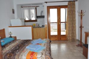 Kuchyň nebo kuchyňský kout v ubytování Giannis Maria Apartments