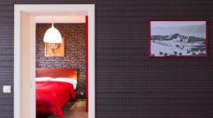Giường trong phòng chung tại Residence Arx & Wellness