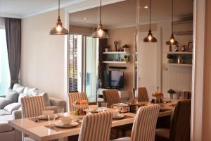 a dining room with a table and chairs at My resort Huahin by D511 in Hua Hin
