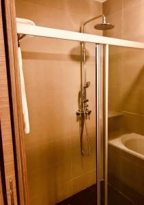 Ένα μπάνιο στο Pefaco Hotel Maya Maya