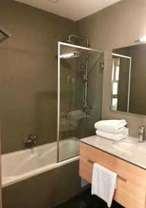 Ένα μπάνιο στο Pefaco Hotel Maya Maya