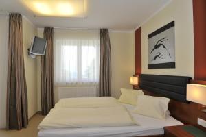 Letto o letti in una camera di Villa Castelli
