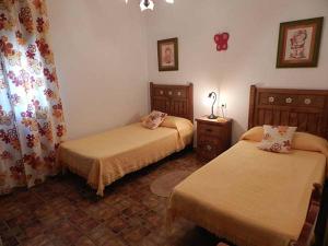 Posteľ alebo postele v izbe v ubytovaní Casas Elena-Conil