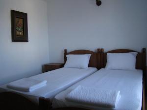 A bed or beds in a room at Casa Hora