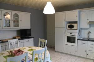 Kuchyňa alebo kuchynka v ubytovaní Au coeur de l'Alsace