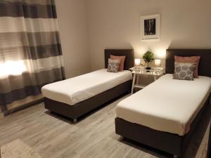 Ένα ή περισσότερα κρεβάτια σε δωμάτιο στο Apartment Bad Homburg