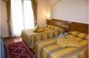 Postel nebo postele na pokoji v ubytování Hotel Piroga Padova + 37 fotografií