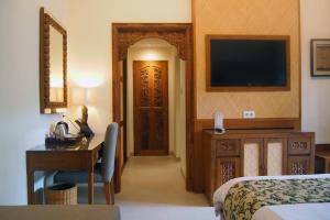 TV a/nebo společenská místnost v ubytování Yulia Village Inn Ubud