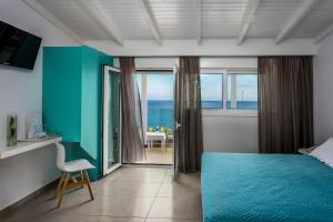 Postel nebo postele na pokoji v ubytování Coral Hotel