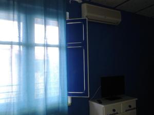 A television and/or entertainment centre at La Casa di Chico