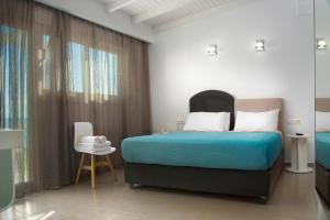 Postel nebo postele na pokoji v ubytování Coral Hotel