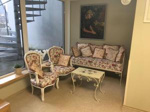 Posezení v ubytování Carolina Hotel