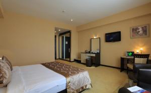 Postel nebo postele na pokoji v ubytování Days Hotel By Wyndham Baku