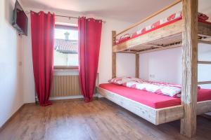 Postel nebo postele na pokoji v ubytování Chalet Holzerstubn