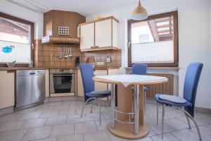 Kuchyň nebo kuchyňský kout v ubytování Chalet Holzerstubn