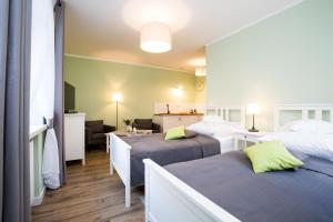 Postel nebo postele na pokoji v ubytování Apartamenty Bystra