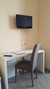 TV a/nebo společenská místnost v ubytování Park Hotel
