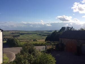 a view of the countryside from a farm house at Bretton Cottage in Eyam