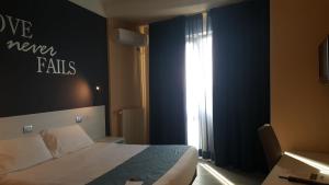 Postel nebo postele na pokoji v ubytování Park Hotel