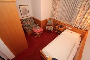 Postel nebo postele na pokoji v ubytování Hotel Goldener Stern