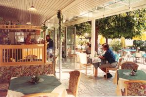 Een restaurant of ander eetgelegenheid bij Strandhotel Pichler