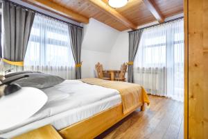 Posteľ alebo postele v izbe v ubytovaní Górskie Wspomnienie