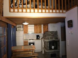 Kuchyň nebo kuchyňský kout v ubytování Lost Inn Cabins