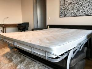 Postel nebo postele na pokoji v ubytování Viru Väljak Lux Apartment