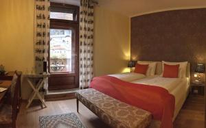 Postel nebo postele na pokoji v ubytování Seehotel Grüner Baum