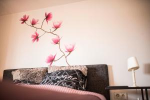 Postel nebo postele na pokoji v ubytování B&B A Dream City spa & Massages