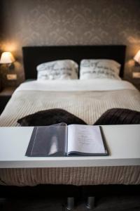 Postel nebo postele na pokoji v ubytování B&B A Dream City spa & Massages