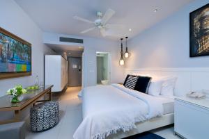 Letto o letti in una camera di Agamim by Isrotel Collection