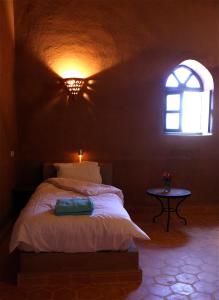 Postel nebo postele na pokoji v ubytování Riad Nomad