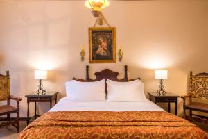 Posteľ alebo postele v izbe v ubytovaní Hotel Dann Monasterio