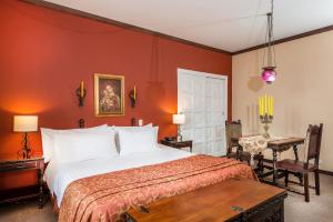 Posteľ alebo postele v izbe v ubytovaní Hotel Dann Monasterio