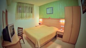 Voodi või voodid majutusasutuse Hostel JUPITER toas