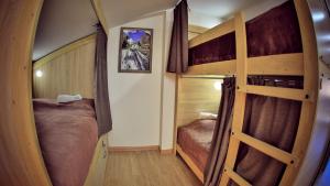 Voodi või voodid majutusasutuse Hostel JUPITER toas