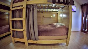 Voodi või voodid majutusasutuse Hostel JUPITER toas