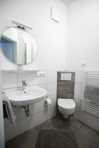Koupelna v ubytování Hotel Zur Alten Börse + 25 fotografií