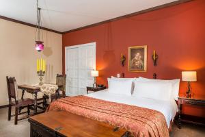 Posteľ alebo postele v izbe v ubytovaní Hotel Dann Monasterio