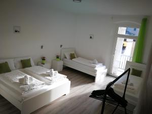 Posteľ alebo postele v izbe v ubytovaní Iceman Room's Central