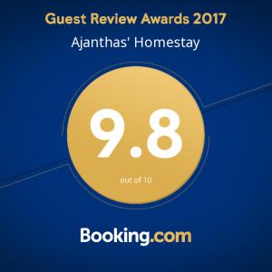 a yellow circle with the words guest review awards atatlantis homiversary at Ajanthas' Homestay in Kandy