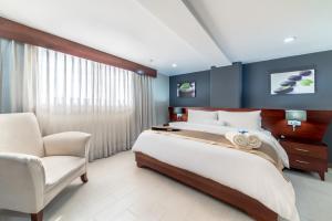 
A bed or beds in a room at Hodelpa Gran Almirante
