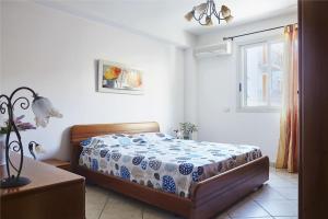 Posteľ alebo postele v izbe v ubytovaní Sabbia1 CaseSicule, Apartment in the City Center and beside the Main Square, Beach at 100 m, Wi-Fi