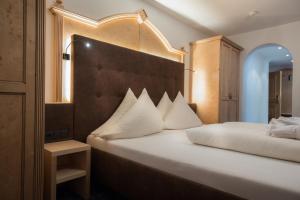 Posteľ alebo postele v izbe v ubytovaní Hotel Albona
