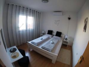 Postel nebo postele na pokoji v ubytování Rooms Deny + 34 fotografií