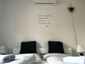 Postel nebo postele na pokoji v ubytování Rooms Deny